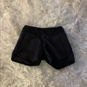a pair of black Aviva shorts